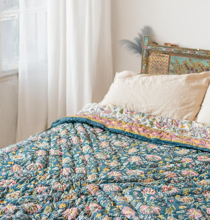 Floral Blockprint Quilt In Bedroom