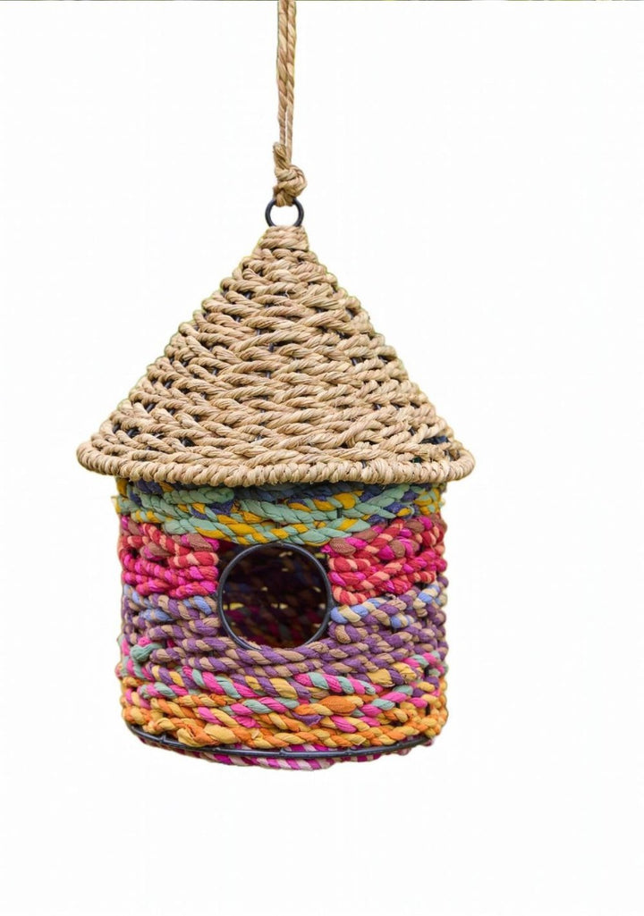 Recycled Birdhouse in a White Background