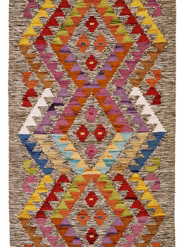 Close Up Of Rainbow Geometric Aztec Rug - Second Nature Online