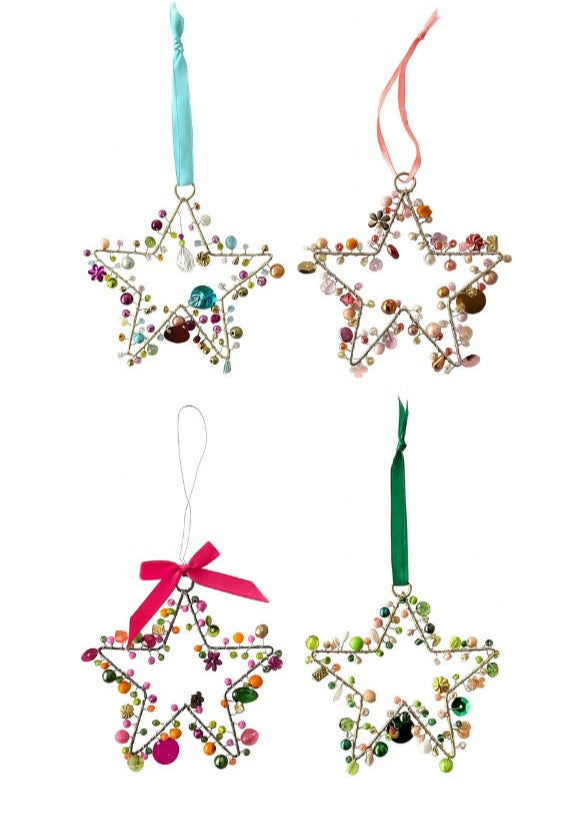 Set of four star-shaped decorative ornaments with colorful beads and ribbons on a white background.