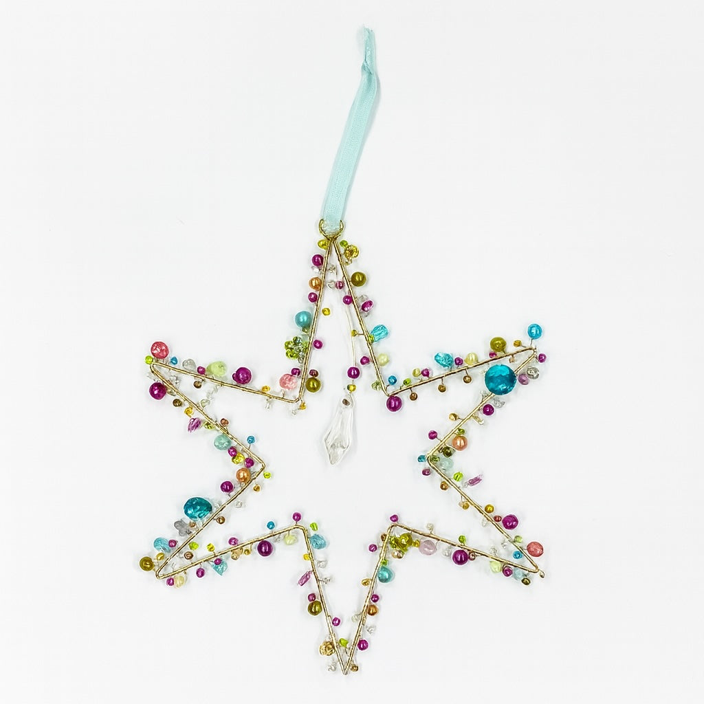 Decorative star ornament with colorful beads on a white background