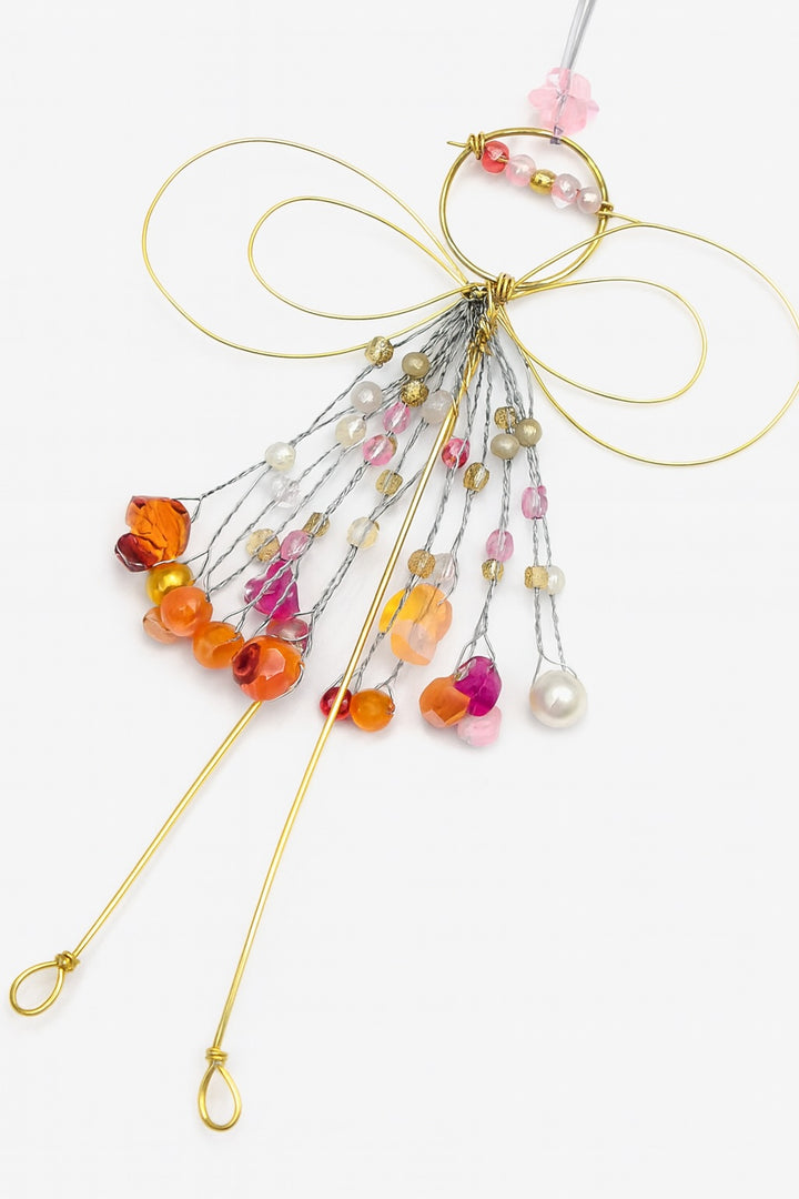 Beaded eyeglass chain with colourful beads and gold accents on a white background