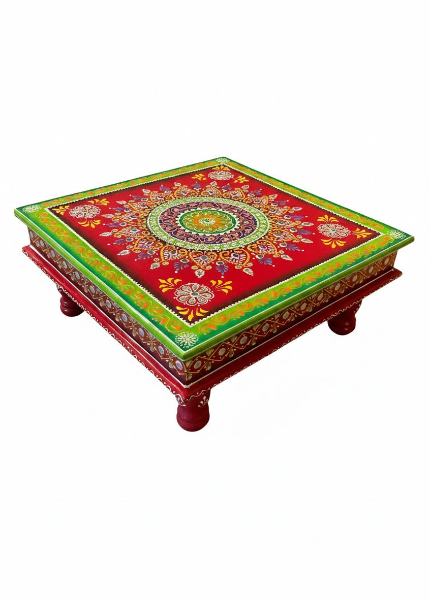 Decorative wooden table with colorful mandala design on a white background