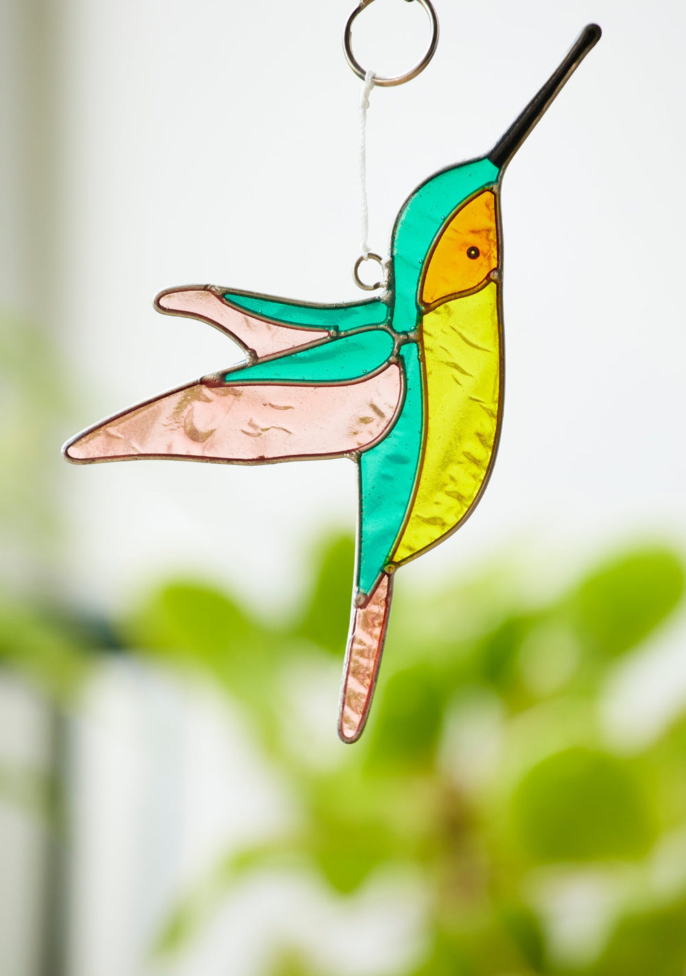 Bird Suncatcher Hanging In Window