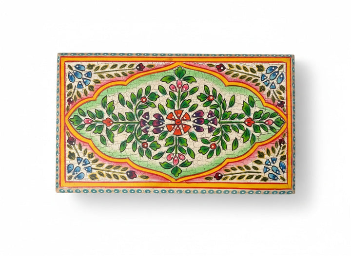 Decorative box with floral patterns on a white background