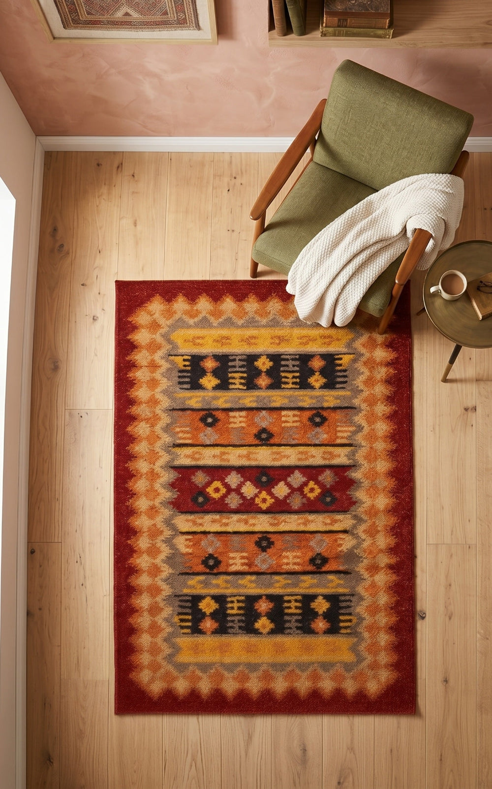 Orange Geometric Kilim Birds Eye View With Green Chair and Table