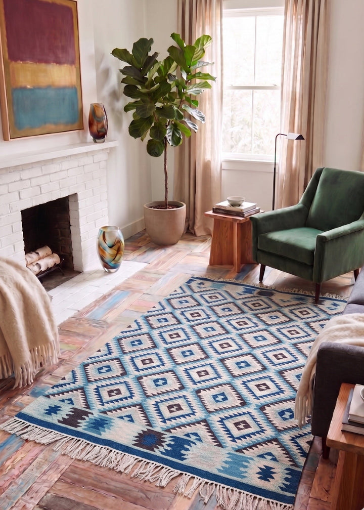 Blue Diamond Pattern Kilim in a living room with wooden floor ad green chair