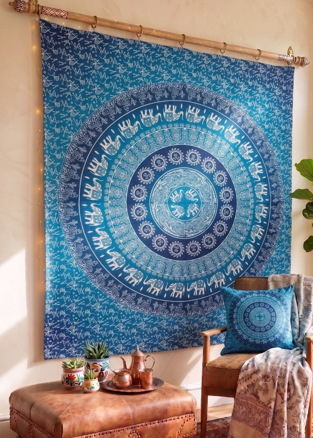 Blue Cotton Elephant Print Wall Hanging with a chair pouf and Cushion.