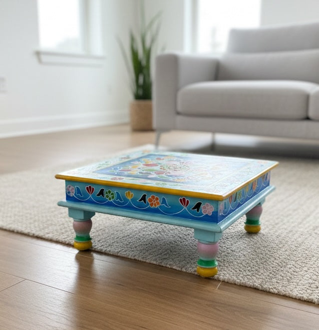 Colourful low table with floral design in a living room setting