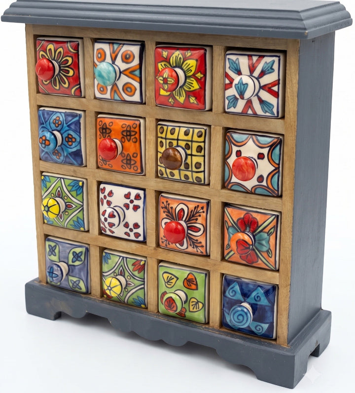Decorative cabinet with ceramic drawers on a white background
