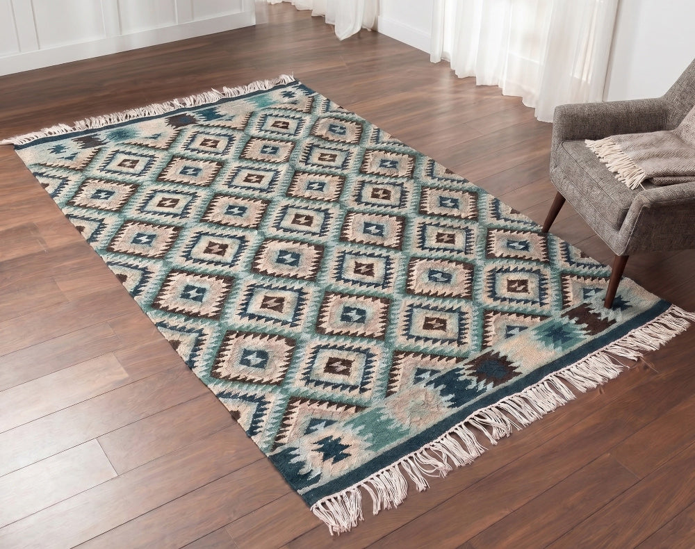Blue Kilim Rug In a Living Room and a grey chair
