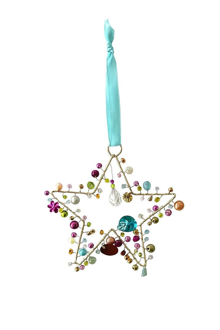 Decorative star ornament with colorful beads and a blue ribbon on a white background