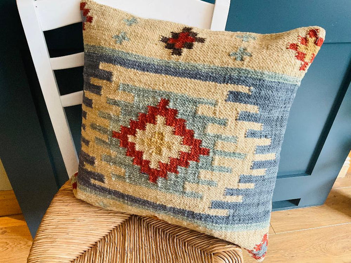 Kilim cushion cover on a chair