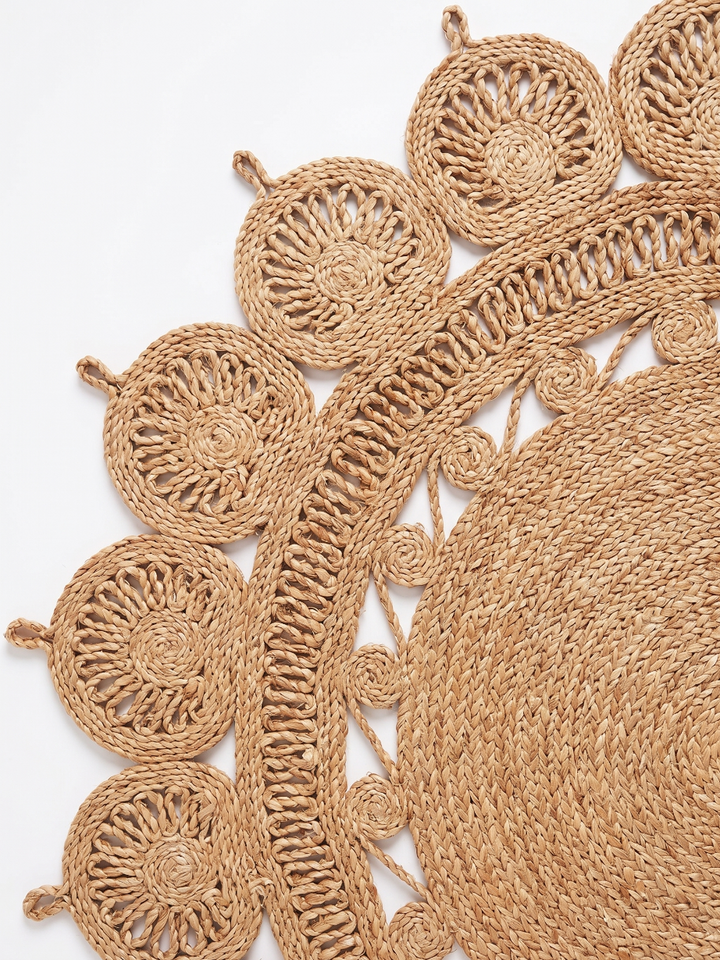 Braided Jute Rug Open Weave Close Up on a white background