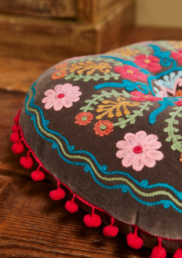 Grey Velvet Cushion Filled Round With Floral Pattern and Pom Pom's