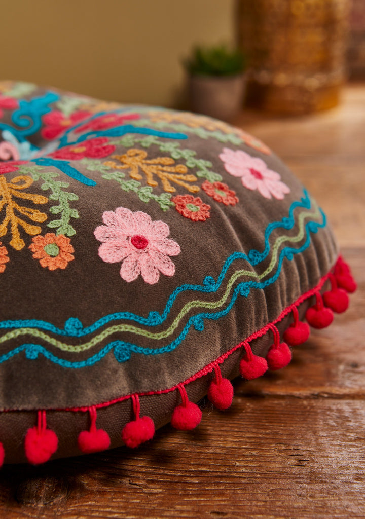 Grey Velvet Cushion Filled Round With Floral Pattern and Pom Pom's