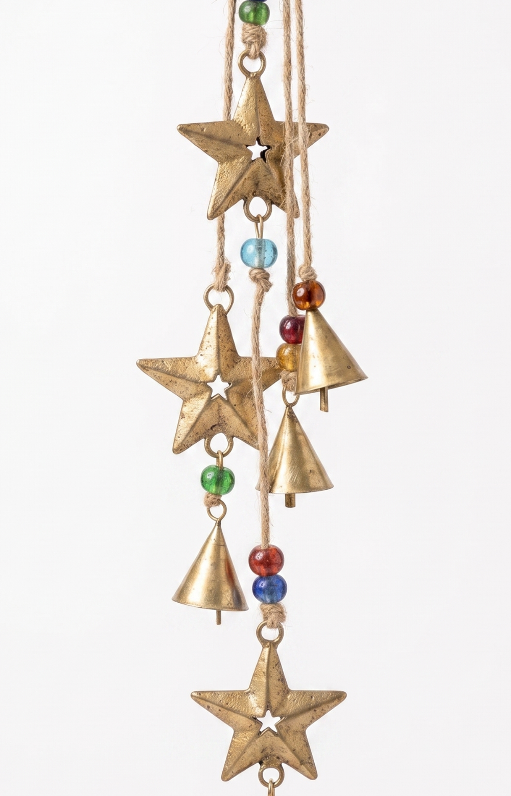 Decorative hanging ornament with stars and bells on a white background