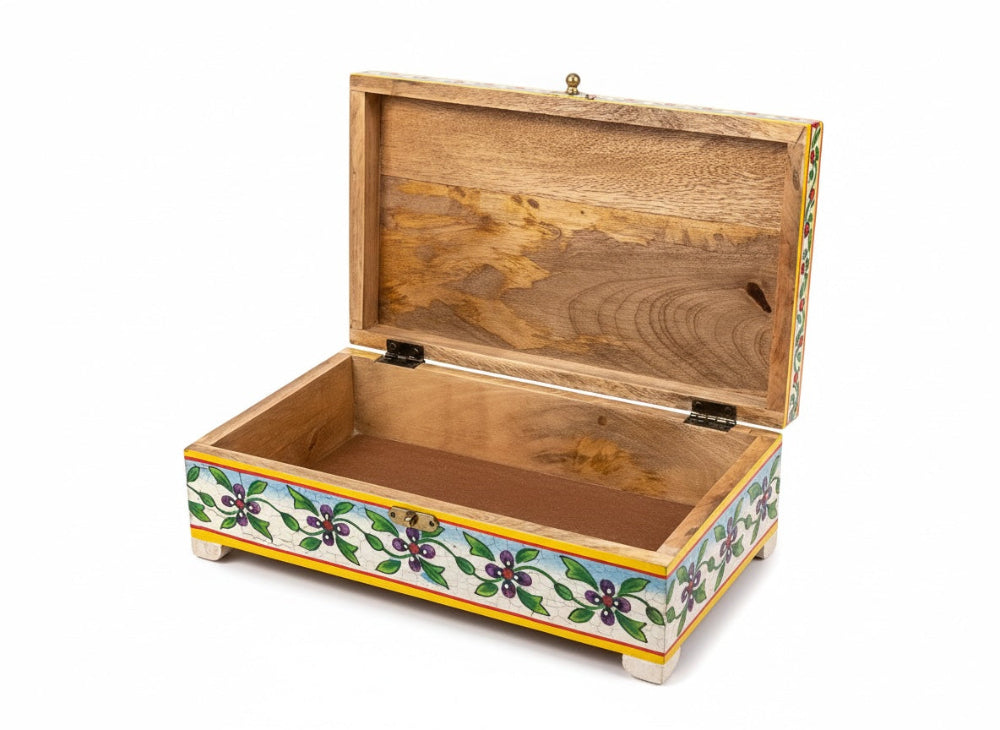 Wooden box with floral patterns on a white background