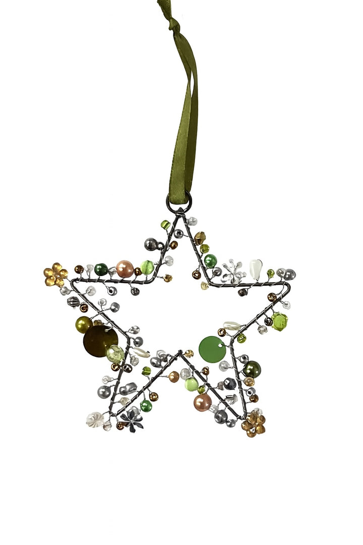 Decorative star ornament with beads on a white background