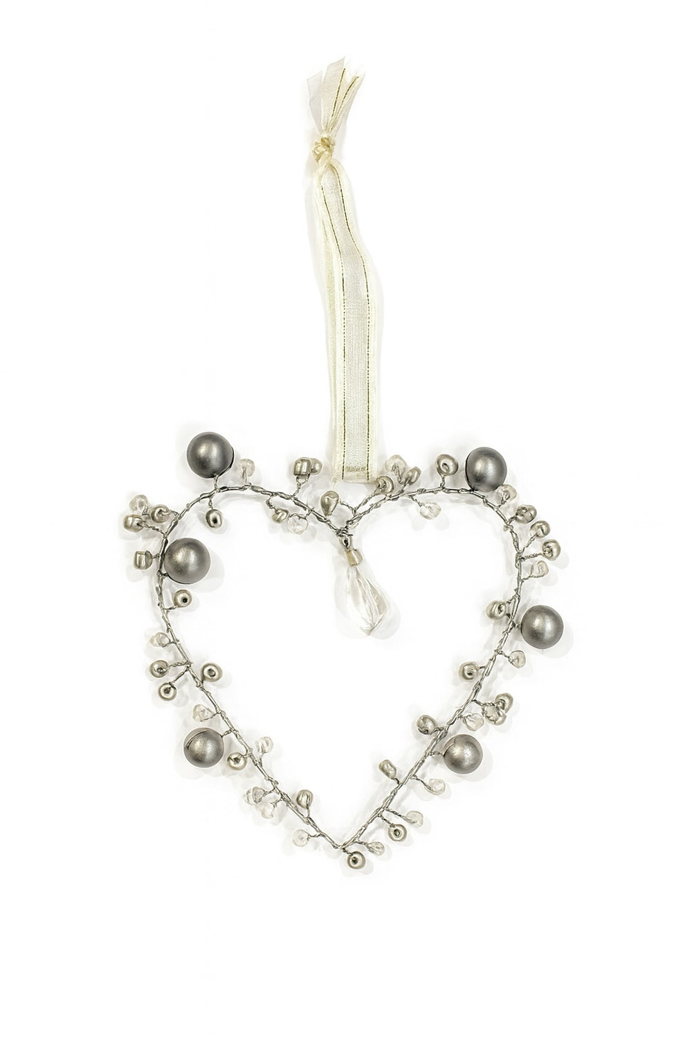 Heart-shaped ornament with pearls on a white background