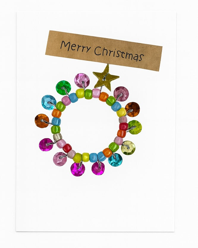 Colourful beaded Christmas wreath with a star on a white background