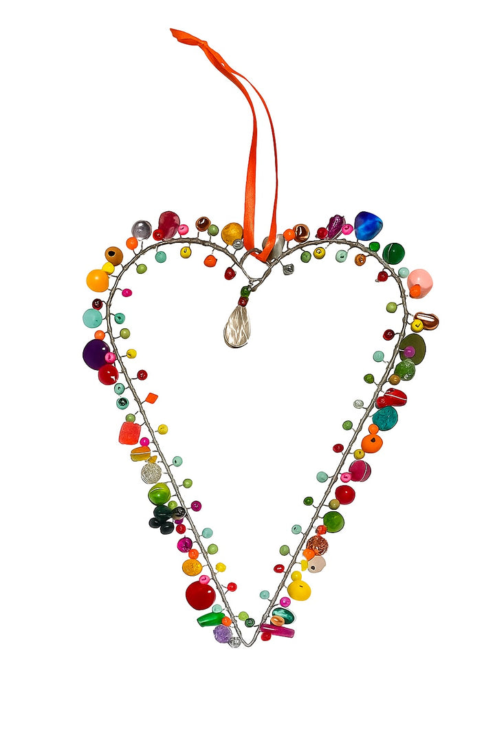 Wire Heart Decoration With Beads and Sequins In a White Background