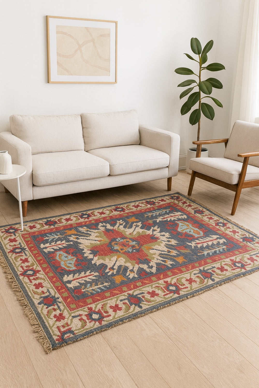 Living room with a patterned rug, white sofa, and armchair.