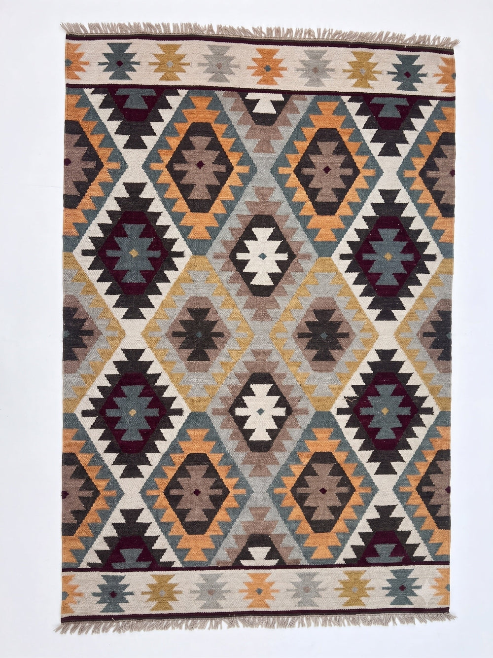Kilim Geometric Rug In a White Background