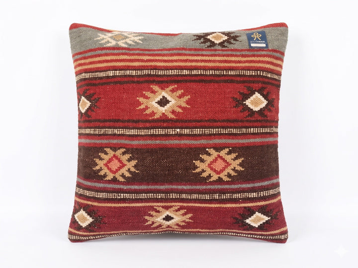 Decorative pillow with geometric pattern on a white background