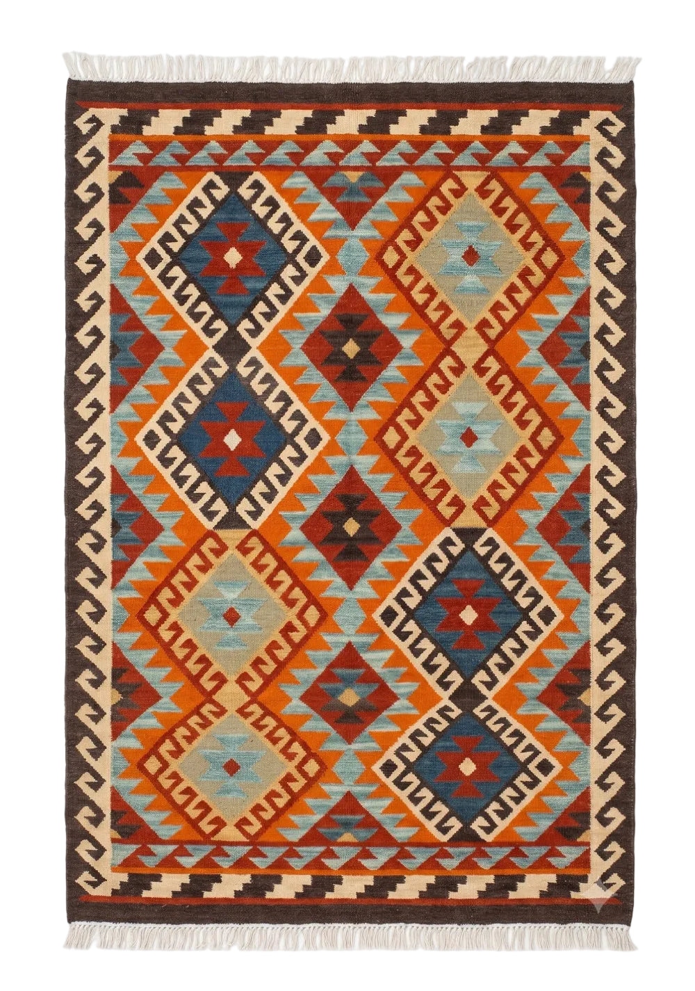 A rectangular woven area rug with a Southwestern geometric pattern, featuring orange, blue, red, and beige diamond motifs with white fringe on the top and bottom.