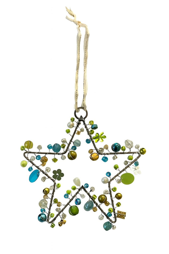 Star-shaped decorative ornament with beads and flowers on a white background