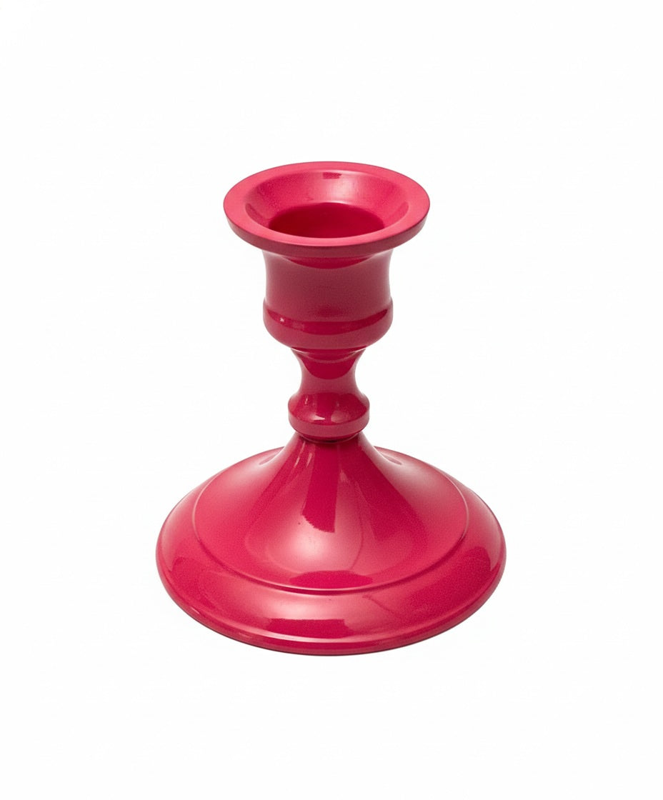 Pink candle holder on a white background