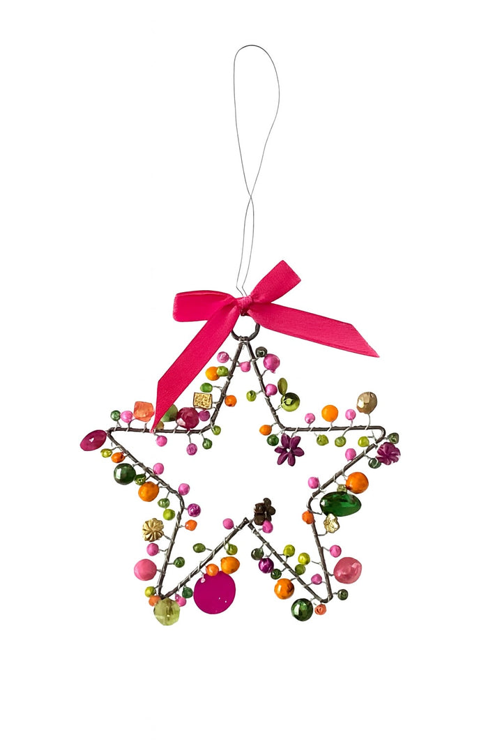 Star-shaped ornament with colorful beads and a pink ribbon on a white background