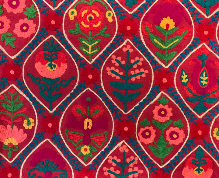 Decorative fabric with red and green floral pattern