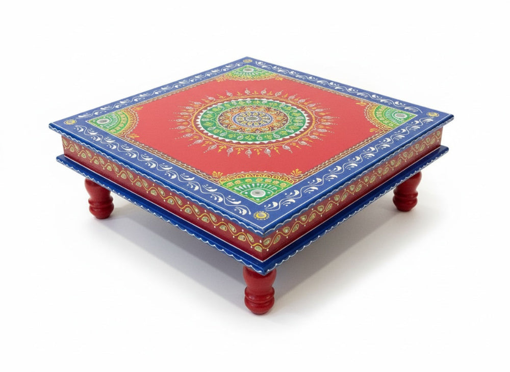 Decorative table with colourful mandala design on a white background