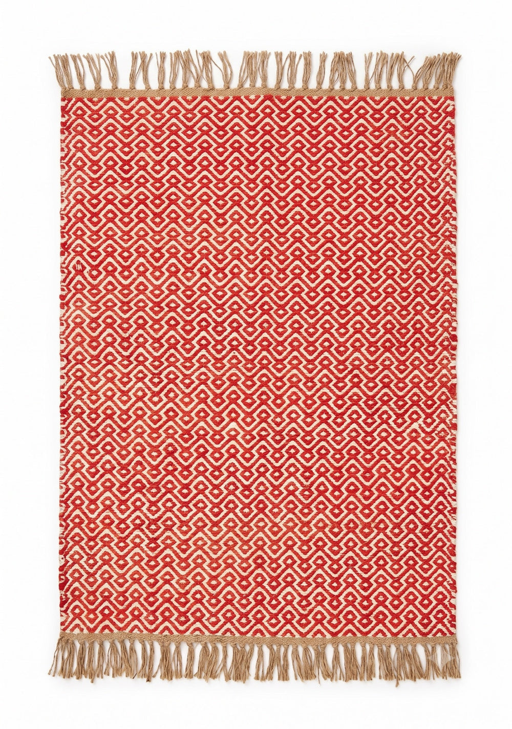 A rectangular woven area rug with a red and beige geometric pattern and fringed edges, shown flat against a white background.