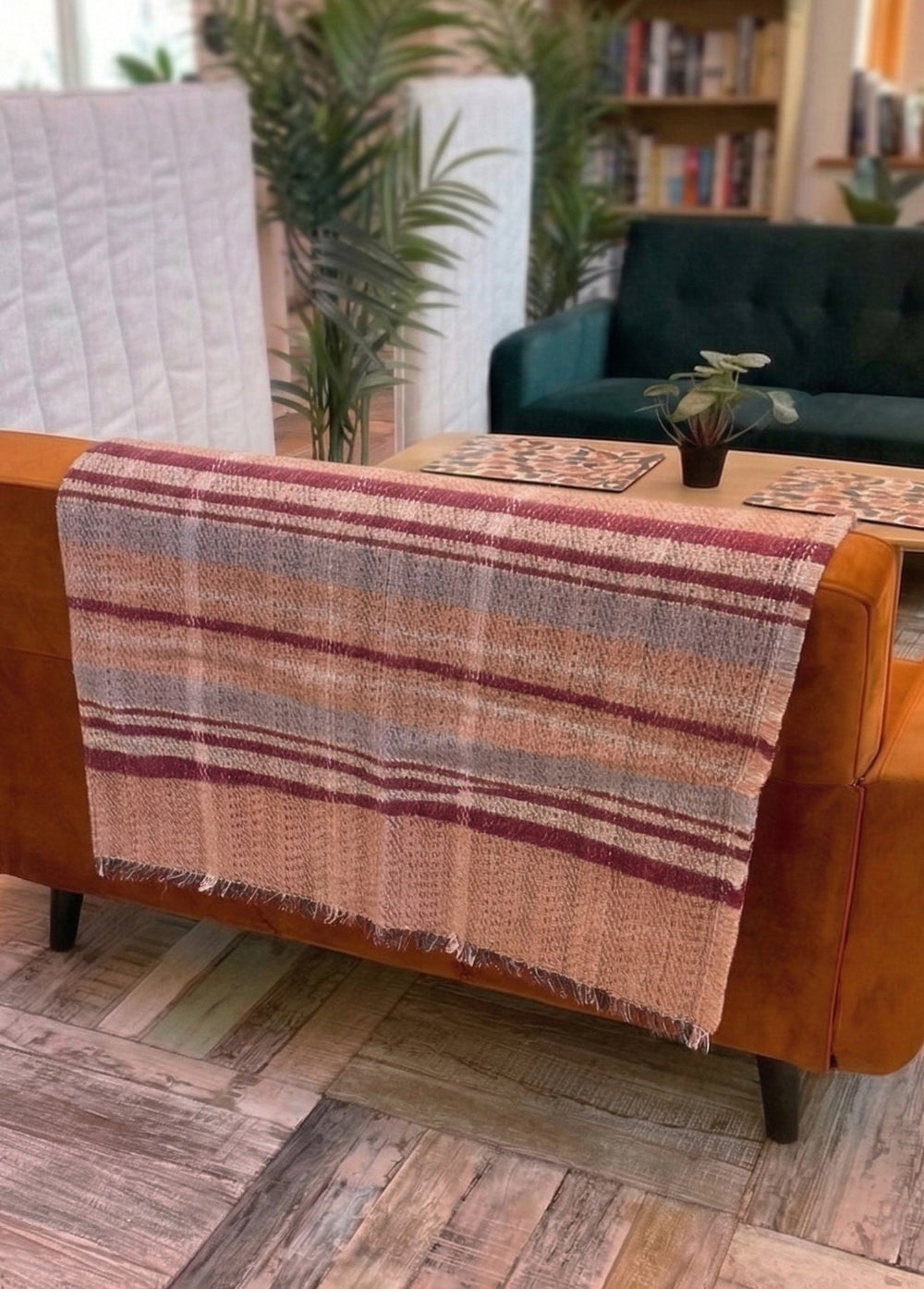 Red Wool Throw Tartan Style Hanging on the back of a sofa