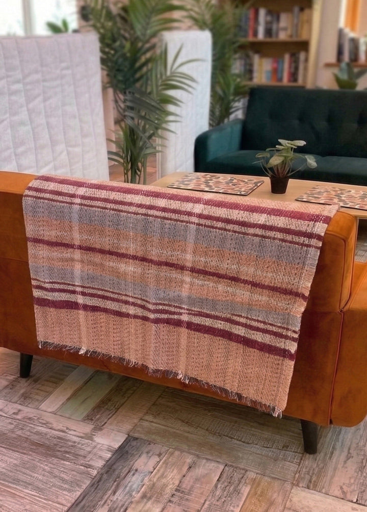 Red Wool Throw Tartan Style Hanging on the back of a sofa