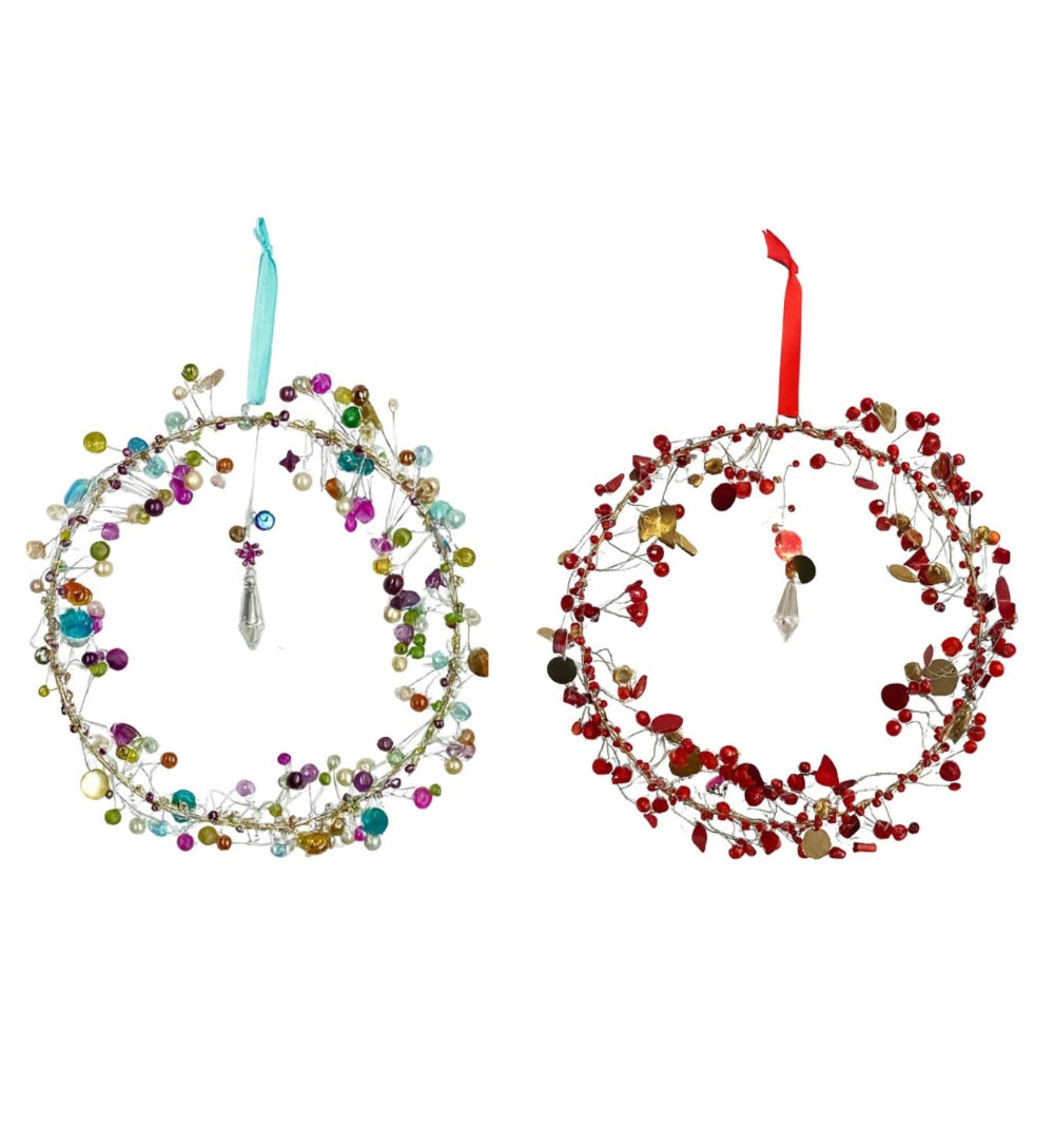 Two beaded wreaths, one multicolored and one red, on a white background.