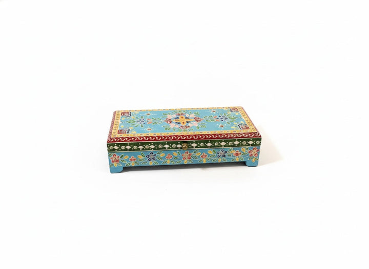 Decorative box with floral patterns on a white background