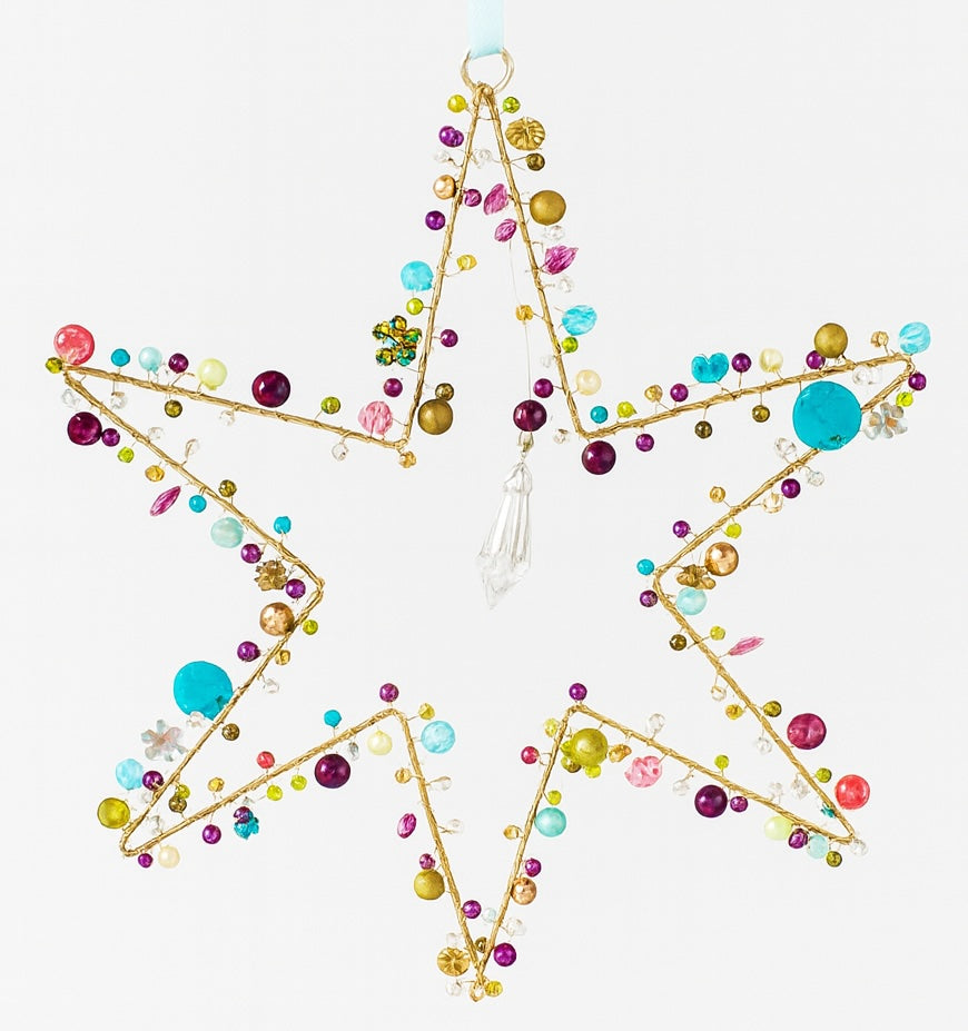Decorative star with colourful beads on a white background