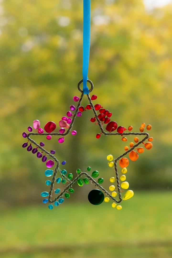 Star Decoration Hanging In A Window