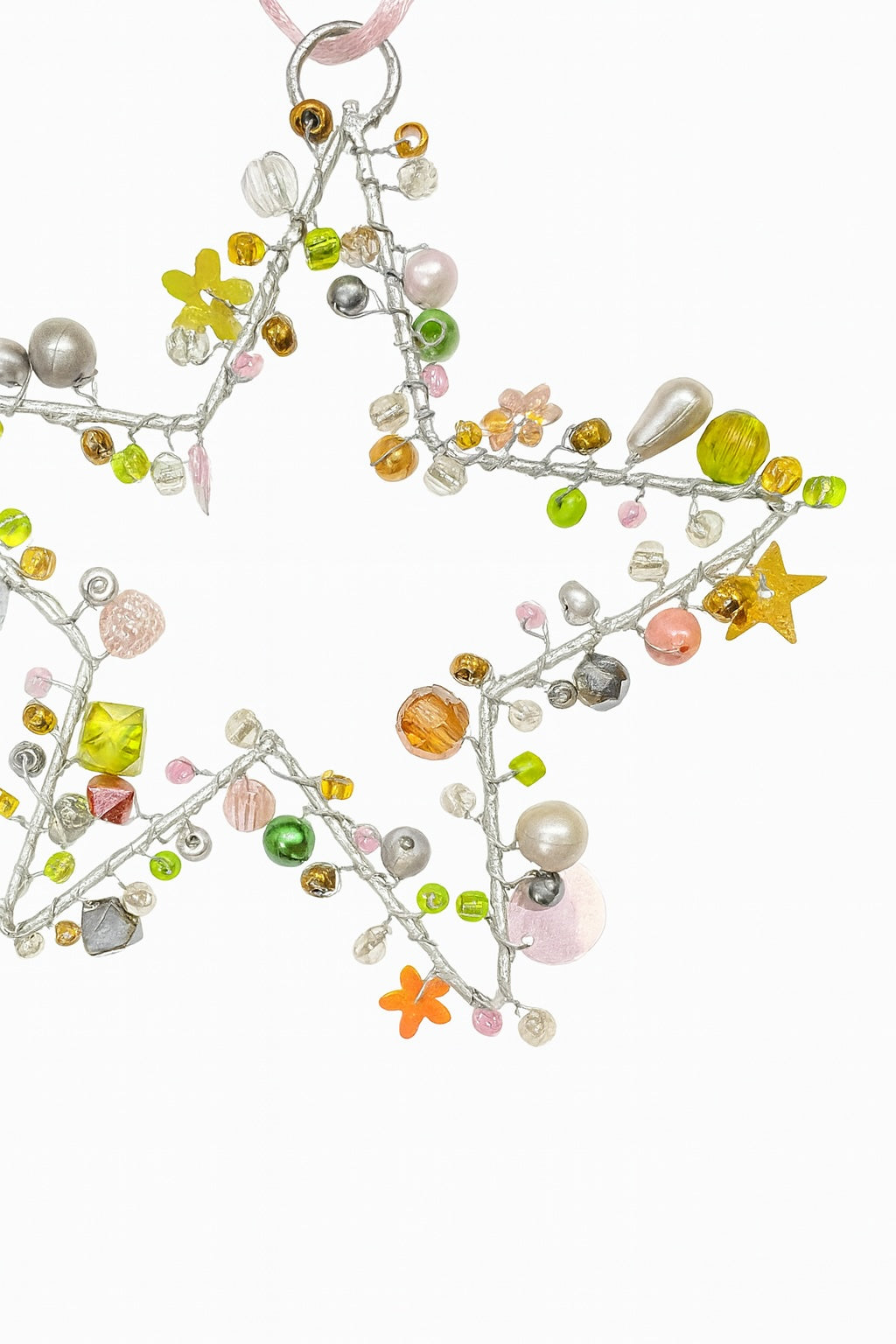 Decorative garland with colourful beads and sequins on a white background