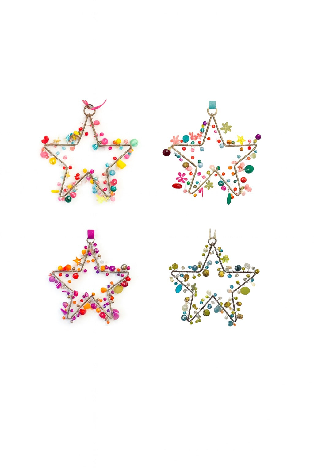 Four colorful star-shaped decorations on a white background