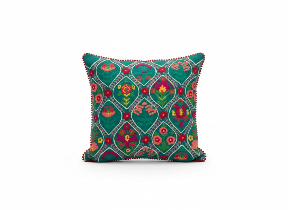 Decorative cushion with floral pattern on a white background