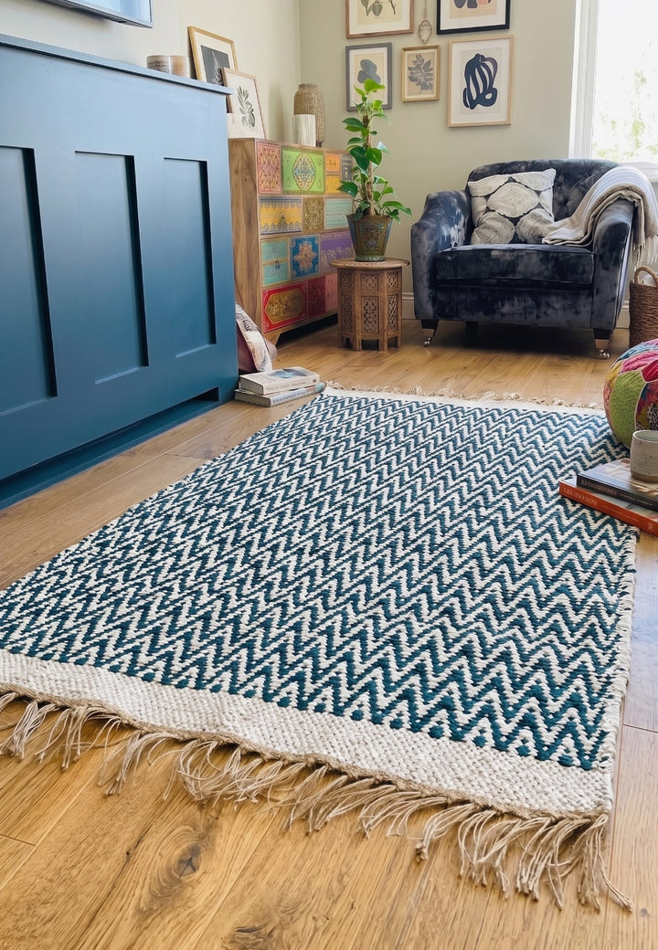 Teal Zig Zag Rug in a living room with chair and fireplace