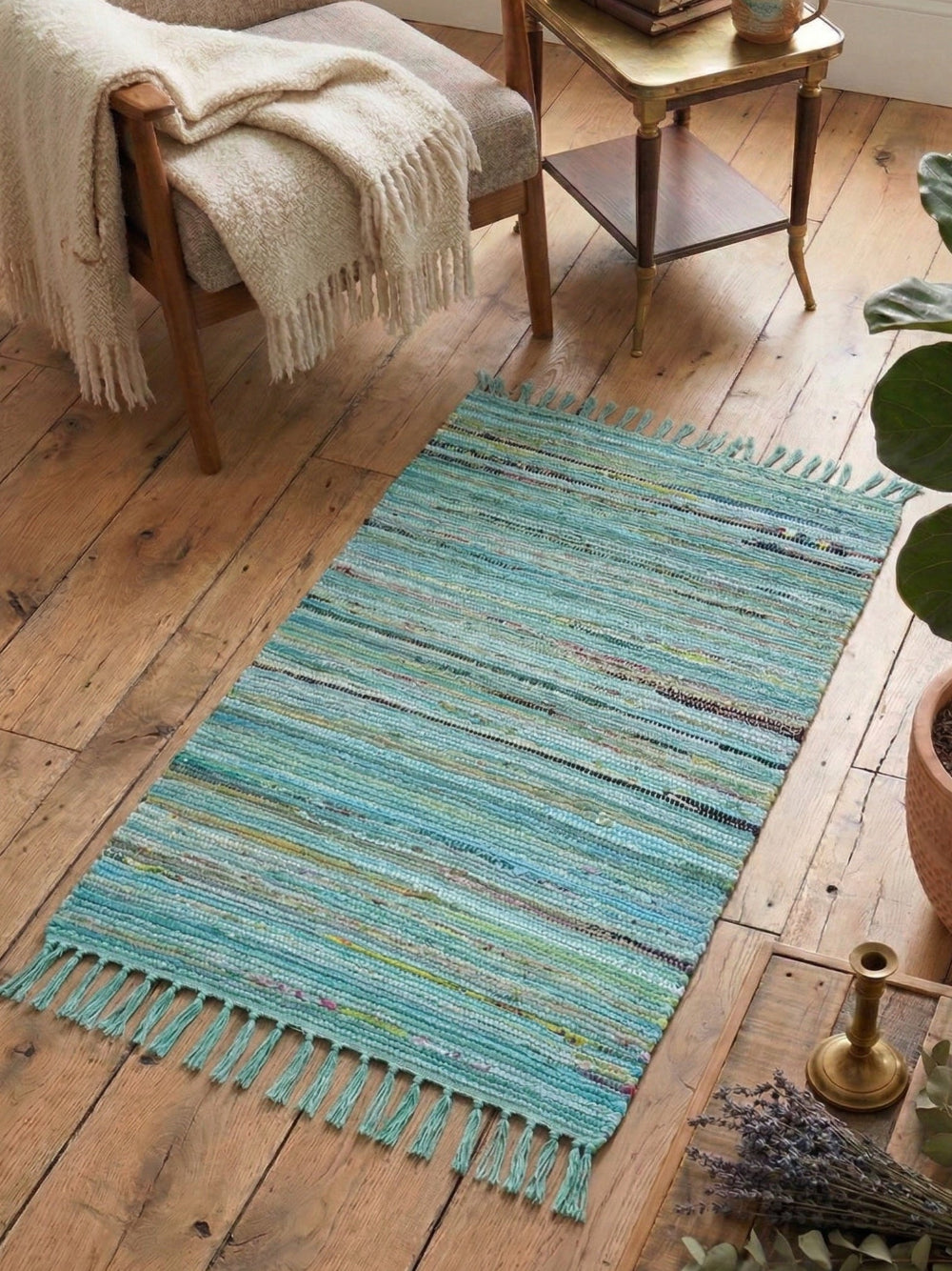 Turquoise Rag Rug in a Living Room on a wooden floor