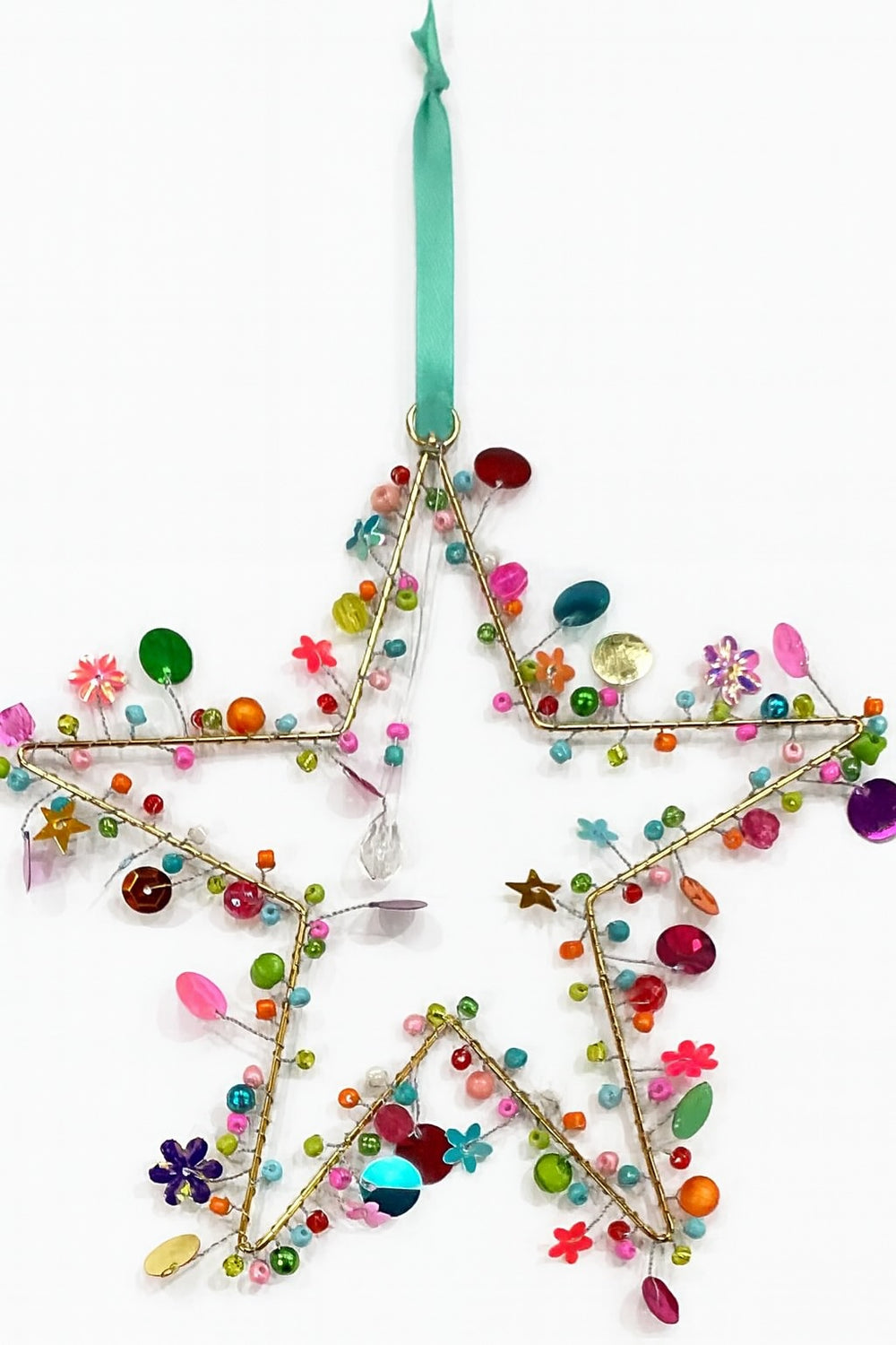 Decorative star ornament with colourful beads and flowers on a white background