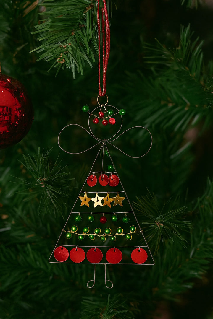 Decorative Christmas tree ornament hanging on a Christmas tree.
