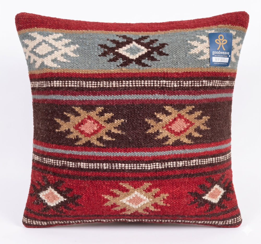 Decorative pillow with geometric pattern on a white background